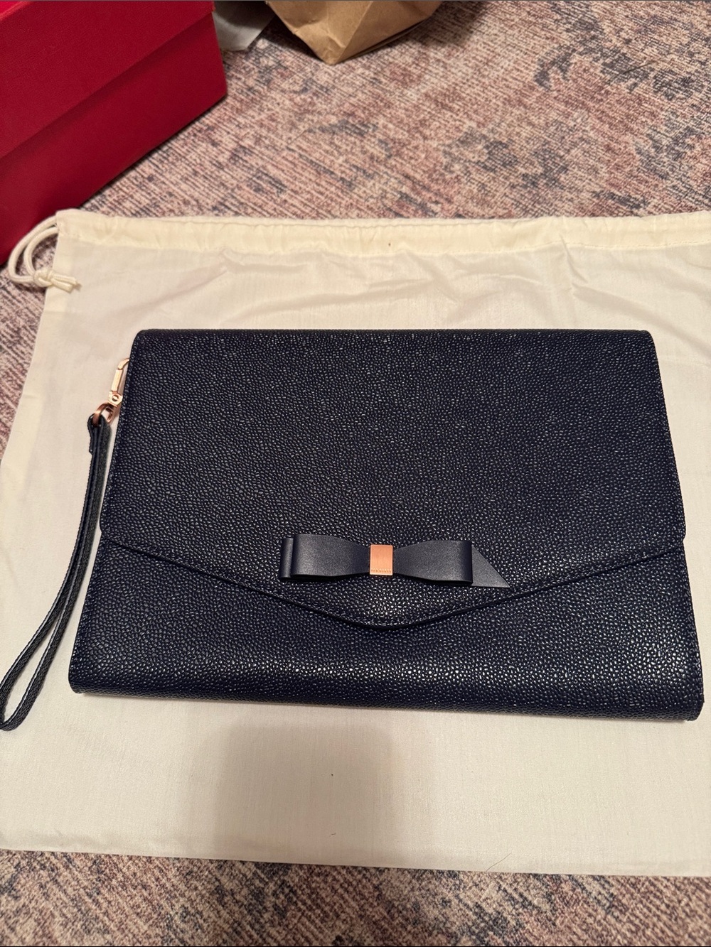 Ted Baker Black Textured Bow Wristlet Clutch with Rose-Gold Accent